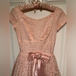Vintage Pink Lace Woman’s Dress era 1960 with satin bow and mesh under skirt